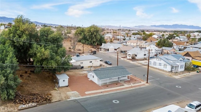 aerial view featuring a residential view and a mountain view