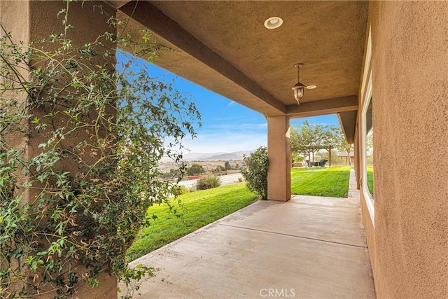 view of patio with a mountain view