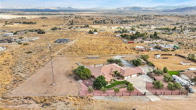 aerial view with a desert view and a mountain view