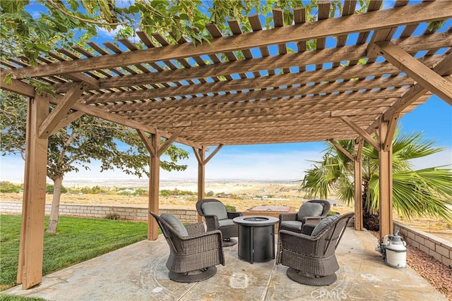 view of patio / terrace with an outdoor fire pit