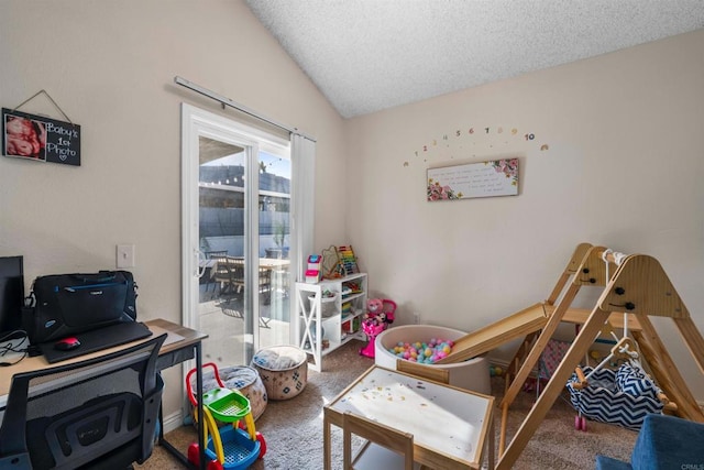 rec room with lofted ceiling, carpet floors, and a textured ceiling