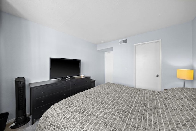 bedroom featuring carpet and visible vents