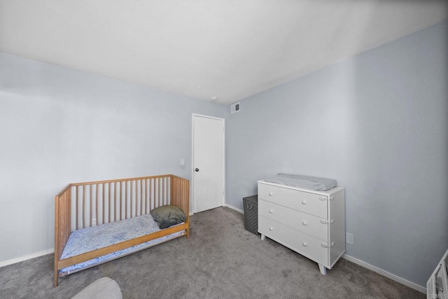 bedroom with carpet flooring, visible vents, and baseboards