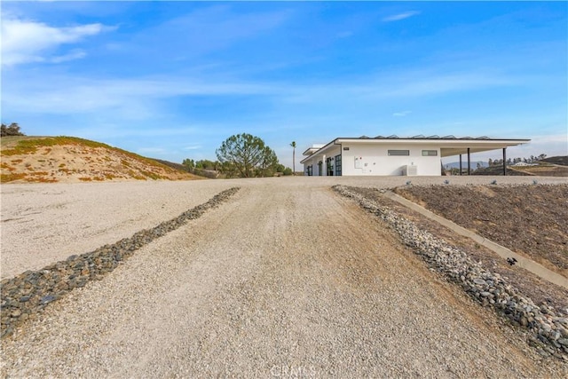 view of street featuring driveway