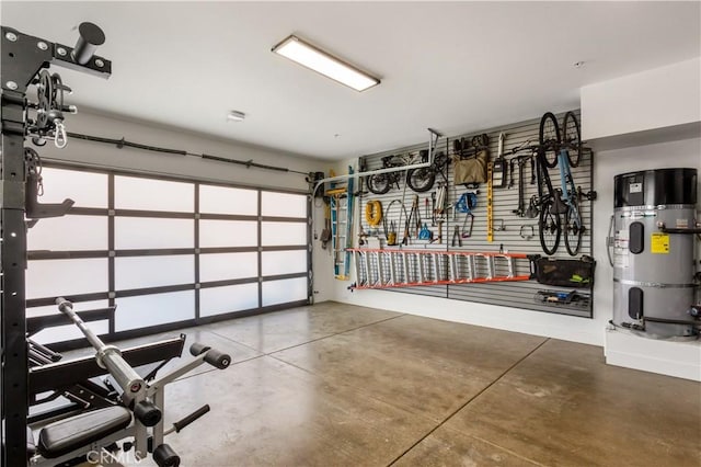 garage featuring bike storage and hybrid water heater