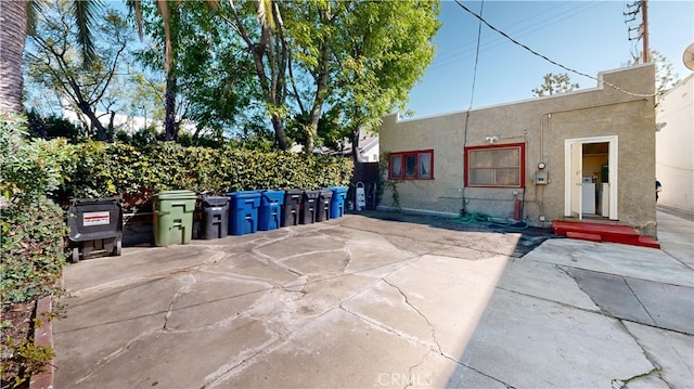 exterior space featuring stucco siding