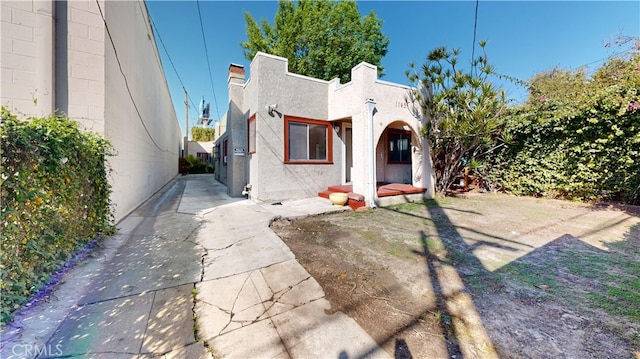 view of front of home featuring stucco siding