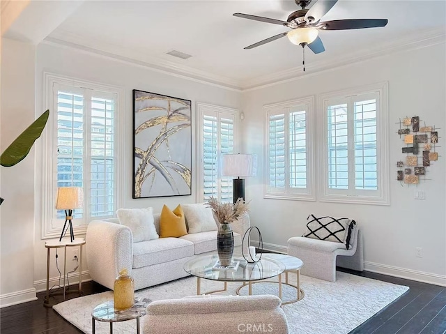 living room featuring baseboards, dark wood finished floors, visible vents, and crown molding