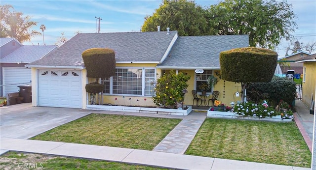 ranch-style home with roof with shingles, stucco siding, concrete driveway, a garage, and a front lawn