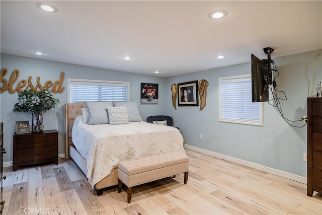 bedroom featuring recessed lighting, light wood-style flooring, and baseboards