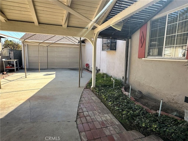 garage featuring driveway