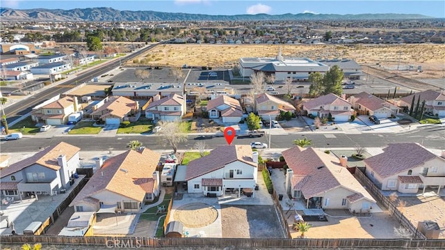 drone / aerial view with a mountain view and a residential view