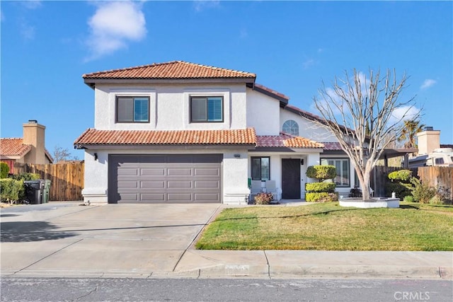 mediterranean / spanish home with stucco siding, concrete driveway, an attached garage, a front yard, and fence