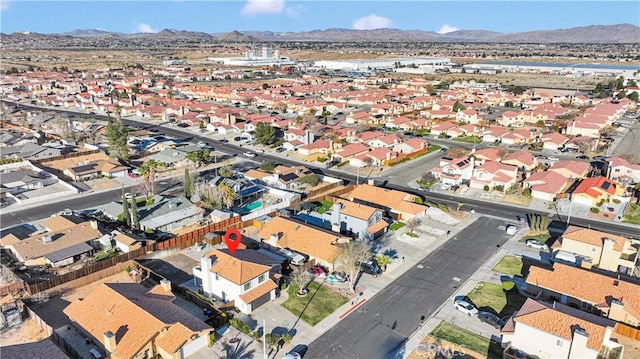 bird's eye view featuring a residential view and a mountain view