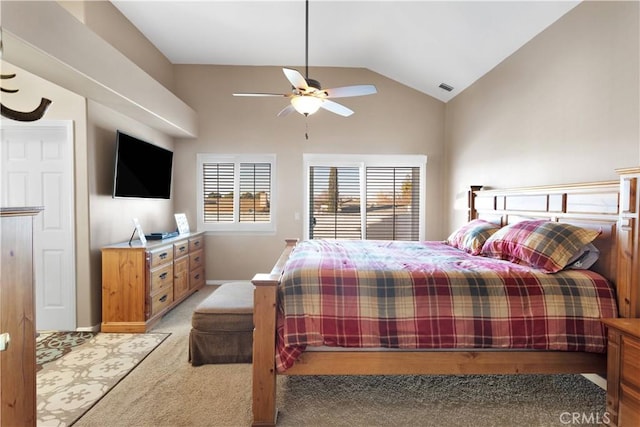 bedroom featuring ceiling fan, light carpet, visible vents, baseboards, and vaulted ceiling