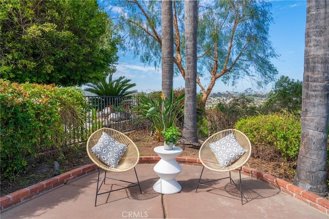 view of patio / terrace with fence