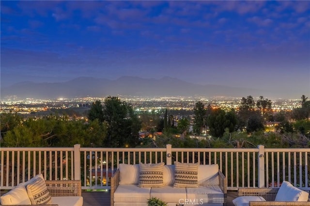 wooden terrace with a mountain view