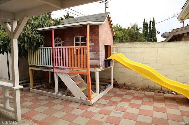 view of playground with fence