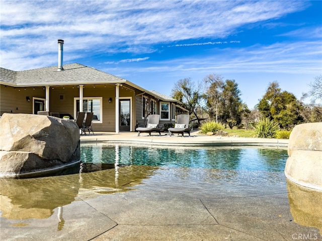 pool featuring a patio