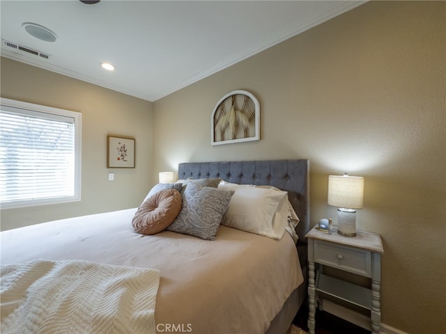 bedroom featuring ornamental molding, recessed lighting, and visible vents