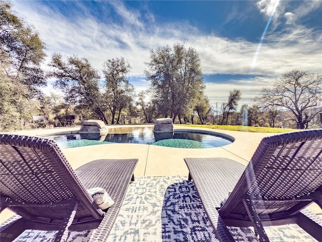 pool featuring a patio