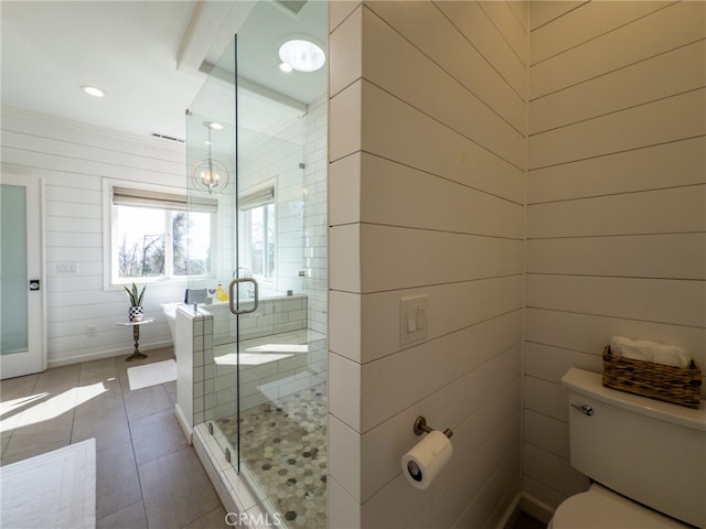 bathroom featuring a stall shower, baseboards, toilet, tile patterned flooring, and recessed lighting