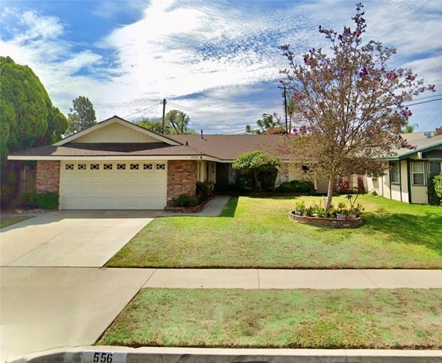 single story home with brick siding, an attached garage, driveway, and a front lawn