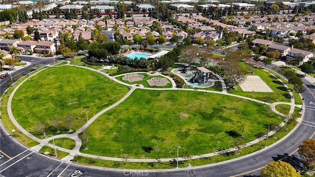 birds eye view of property with a residential view