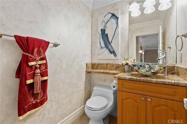 half bath with ornamental molding, tile patterned flooring, vanity, and toilet