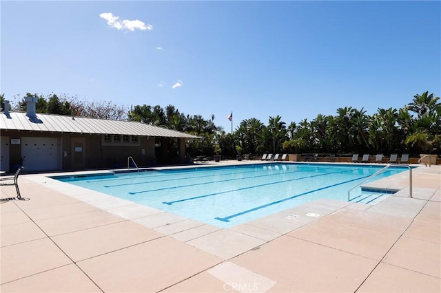 pool featuring a patio area