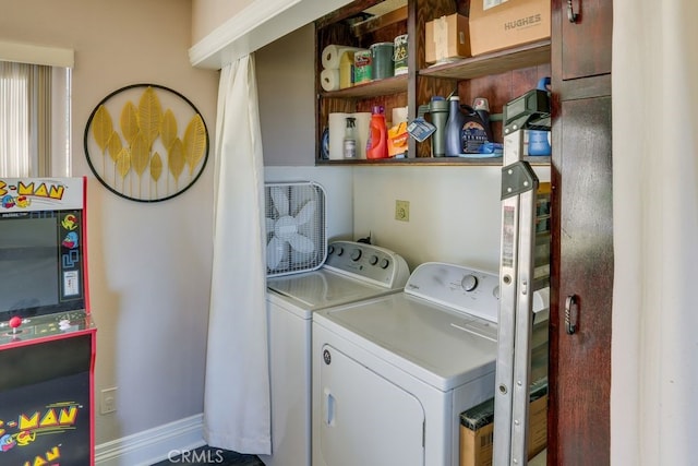 633 Arth Dr, Crestline, CA 92325 - laundry room featuring laundry area, separate washer and dryer, and baseboards