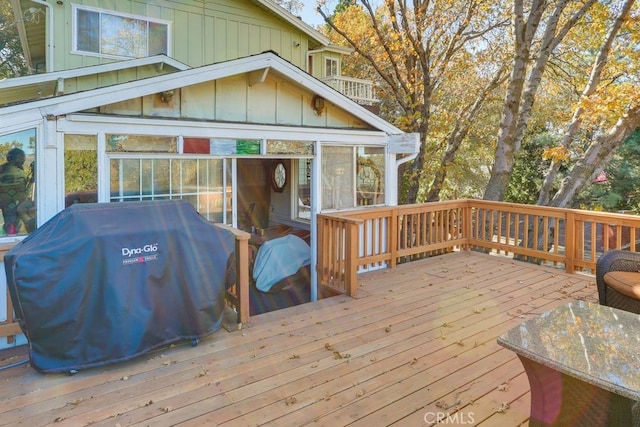 633 Arth Dr, Crestline, CA 92325 - wooden deck with a sunroom and a grill