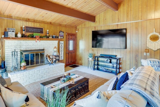 living area with carpet, a brick fireplace, and wood walls