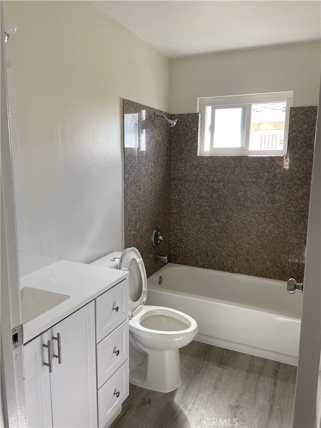18209 Camino Bello Unit 4, Rowland Heights, CA 91748 - full bath featuring toilet, vanity, shower / bathtub combination, and wood finished floors
