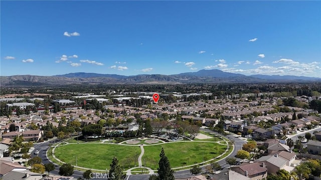 drone / aerial view with a residential view and a mountain view