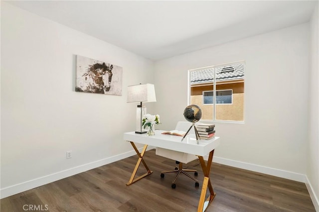 home office with baseboards and wood finished floors