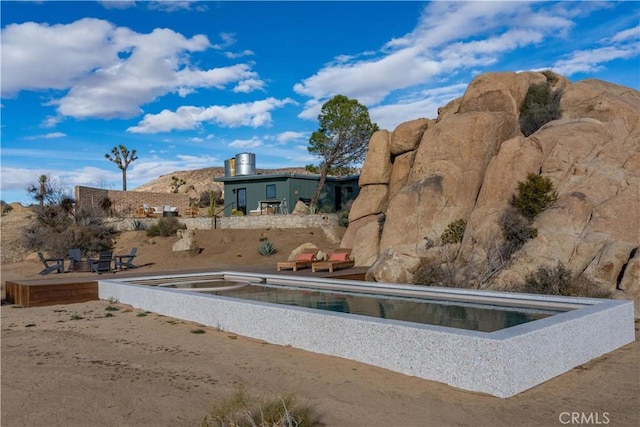 exterior space with a pool