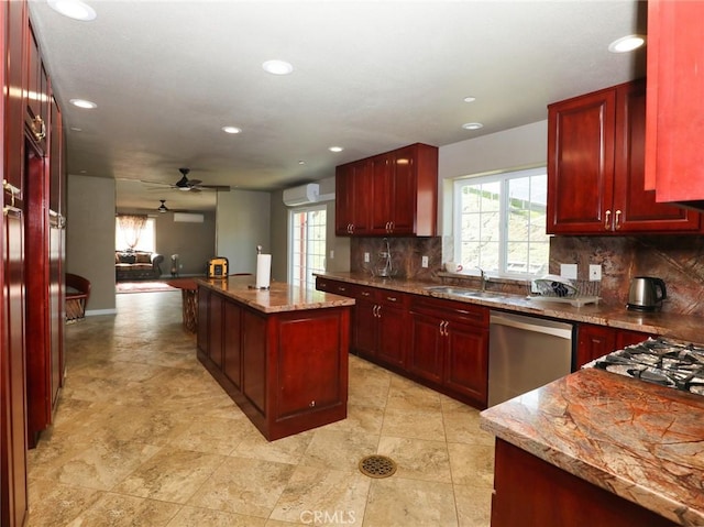 kitchen featuring stainless steel dishwasher, dark brown cabinets, and a sink