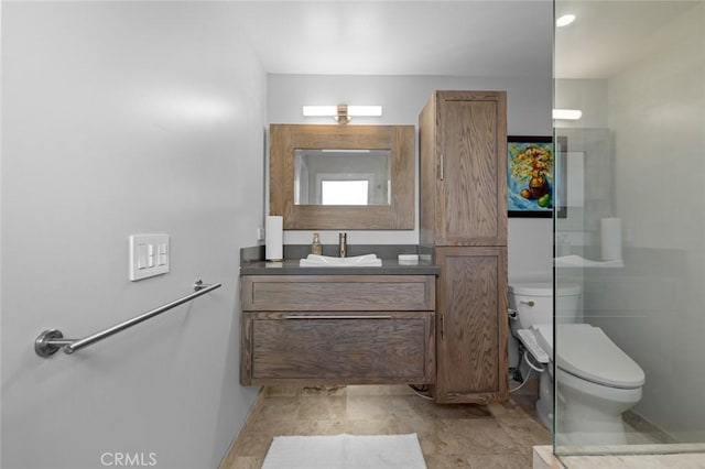 full bathroom featuring vanity and toilet