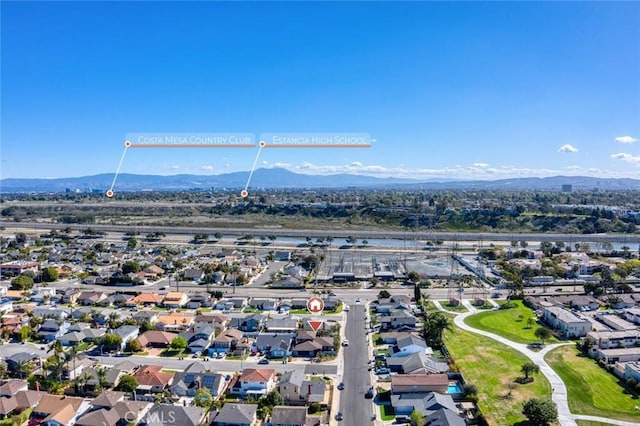 aerial view featuring a residential view and a mountain view