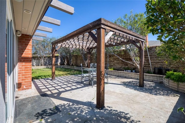 view of patio / terrace with fence and a pergola