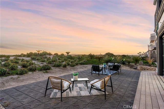 view of patio / terrace with a deck and an outdoor living space