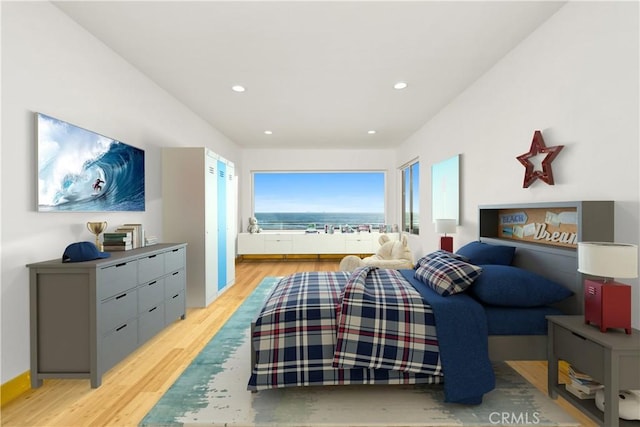 bedroom with baseboards, recessed lighting, and light wood-style floors