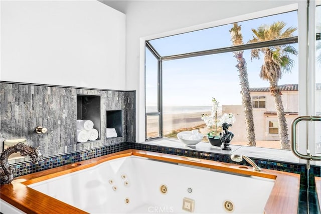 bathroom with a whirlpool tub