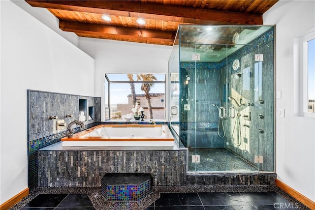 bathroom featuring wooden ceiling, beamed ceiling, and a whirlpool tub