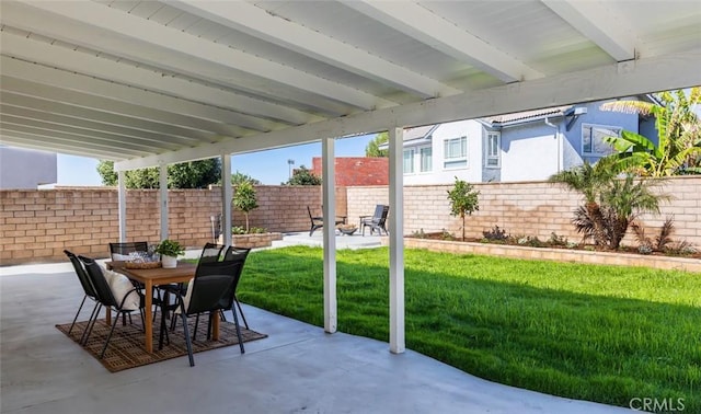 view of patio / terrace with outdoor dining area and fence