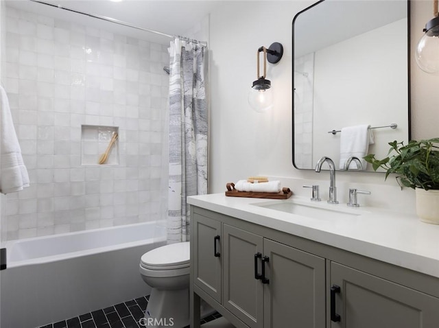 full bath featuring shower / tub combo, toilet, vanity, and tile patterned flooring