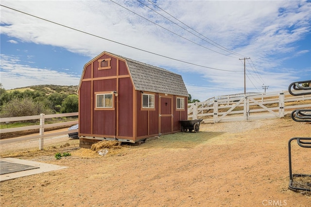 view of shed featuring a fenced backyard