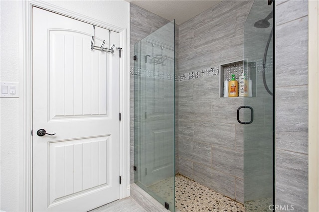 full bath featuring a stall shower