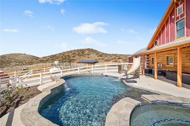 33210 Crown Valley Rd, Temecula, CA 92592 - view of swimming pool with a mountain view, a fenced backyard, central AC unit, and a water slide